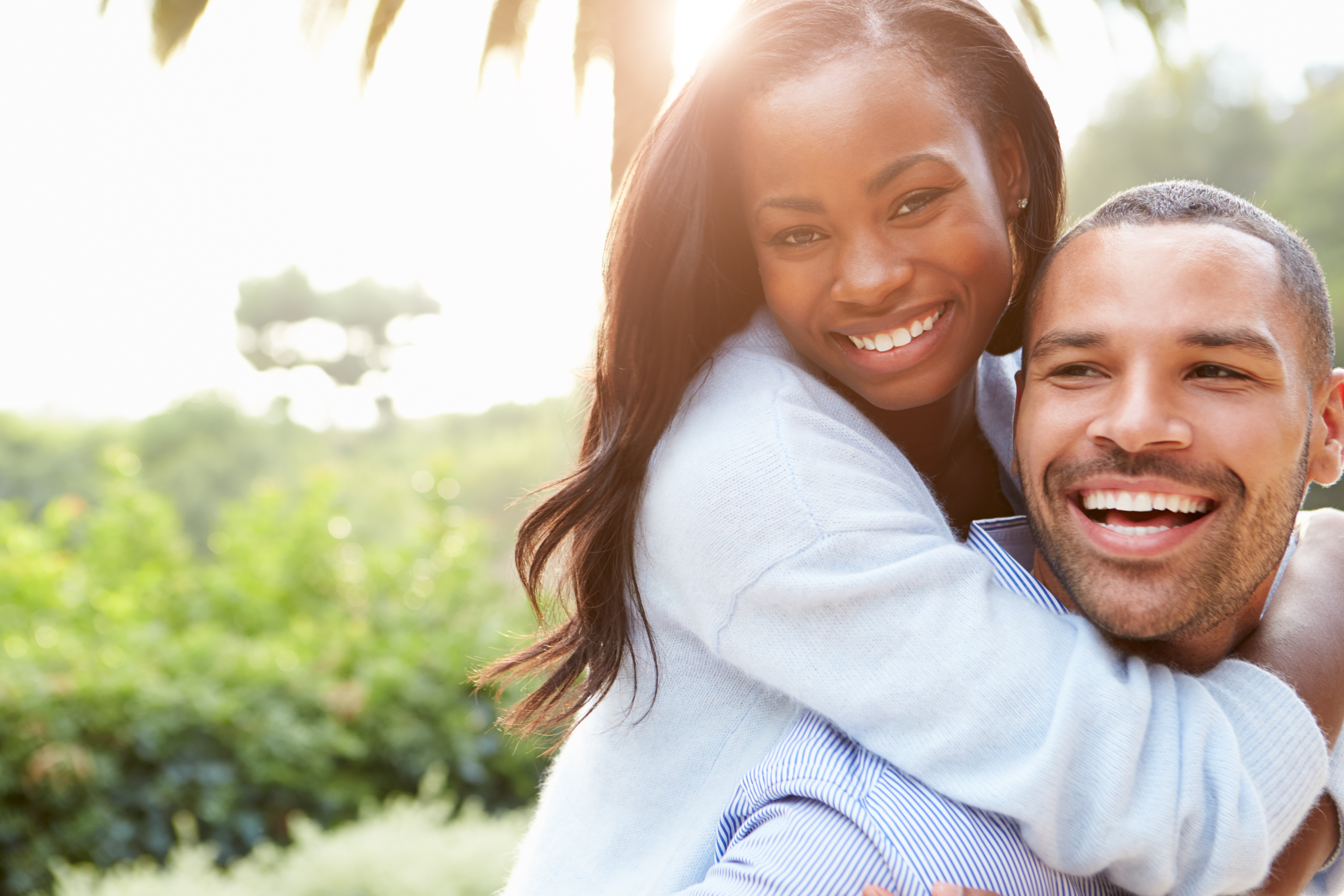 Portrait Of Loving African American Couple In Countryside